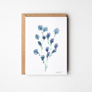 Eco-friendly watercolour print of soft, delicate blue flowers with fine brushstrokes and a calming, airy composition.