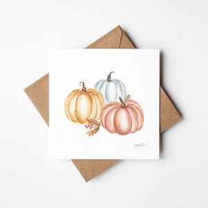 Watercolour illustration of autumn pumpkins in vibrant orange, capturing the essence of the season.