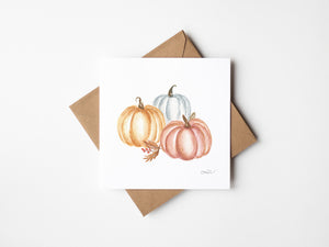 Watercolour illustration of autumn pumpkins in vibrant orange, capturing the essence of the season.