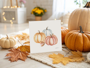 Watercolour illustration of autumn pumpkins in vibrant orange, capturing the essence of the season.
