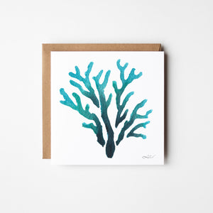 Eco-friendly watercolour print greeting card illustration of vibrant coral with a blend of bright blues and coral hues.