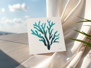 Eco-friendly watercolour print greeting card illustration of vibrant coral with a blend of bright blues and coral hues.