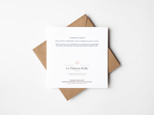 Back of eco-friendly watercolour print greeting card illustration of a blue anchor, symbolizing strength and stability with nautical details.