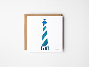 Eco-friendly watercolour print greeting card illustration of a blue lighthouse, symbolizing guidance and strength.