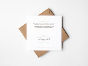 Back of Winter Wreath greeting card that includes an eco-positive statement. 