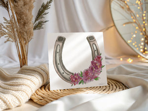 Pink Fortune watercolor greeting card featuring a horseshoe surrounded by pink crepe myrtle blossoms, nature-inspired art on sustainable paper