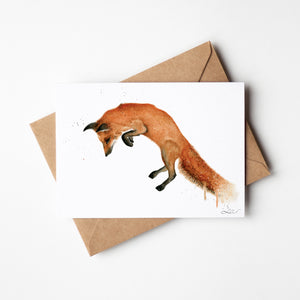 Watercolour illustration of a pouncing fox.