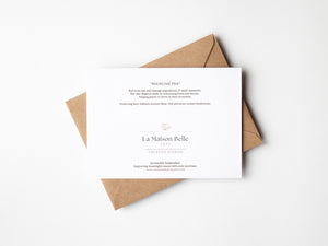 Back of Pouncing Fox greeting card that includes an eco-positive statement.