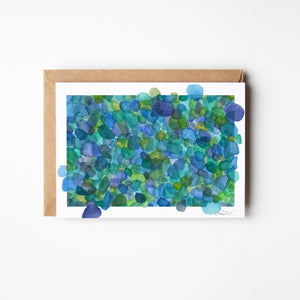 Eco-friendly greeting card featuring a watercolour print of Azure Sea Glass, symbolizing nature's transformation and beauty.