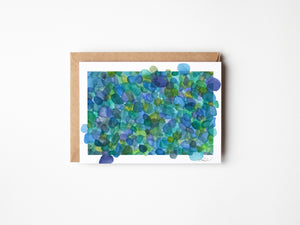 Eco-friendly greeting card featuring a watercolour print of Azure Sea Glass, symbolizing nature's transformation and beauty.