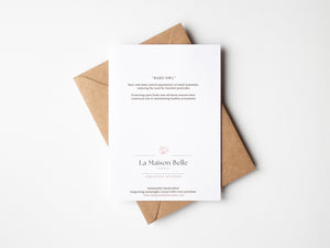 Back of Barn Owl greeting card that includes an eco-positive statement. 