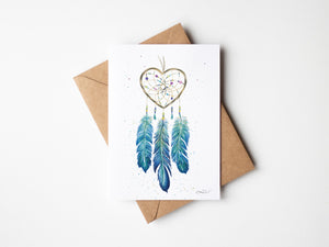 Watercolour greeting card featuring a dreamcatcher with a blue-themed design and a heart-shaped center. The card symbolizes love for nature, water, and the earth with intricate details and calming blue tones.