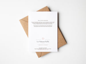 Back of Blue Petal Blooms greeting card which includes an eco-positive statement.