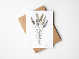 Watercolour greeting card featuring pampas grass in delicate, neutral tones with soft, feathery plumes. The design evokes a sense of calm and boho-inspired beauty, capturing the serene elegance of nature.