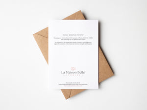 Back of Boho Whispers Pampas greeting card that includes an eco-positive statement.