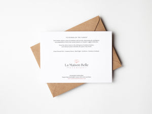 Back of Feathers of the North greeting card that includes an eco-positive statement.