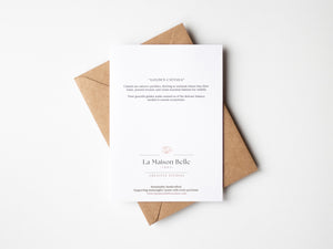 Back of Golden Cattails greeting card that includes an eco-positive statement.