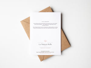 Back of eco-friendly lilac watercolour greeting card with soft lavender and violet floral design.