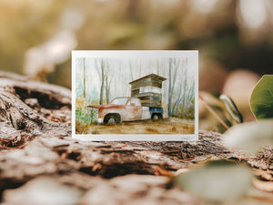 Watercolour greeting card featuring an old truck, Ol' Rusty, converted into a deer stand in a misty field. The design reflects the passage of time as nature reclaims the weathered truck, blending tradition and the beauty of the wild.