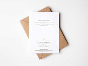 Festive Ornaments Greeting Card – Eco-friendly greeting card featuring a delicate watercolour illustration of ornamental balls hanging from a Christmas tree, capturing the magic of the holiday season.