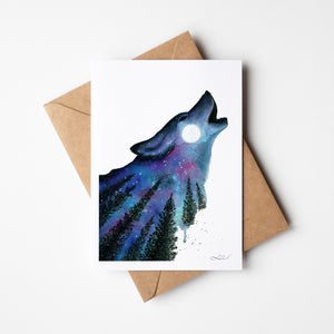 Watercolour greeting card featuring a silhouette of a wolf howling at a full moon, set against a backdrop of a vibrant aurora and a starry sky. The design captures the mystical and untamed beauty of the night.