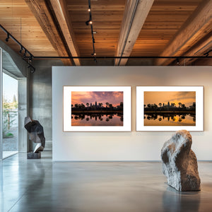 Fine art diptych of Angkor Wat at dawn and sunrise, featuring soft to golden light, mirrored reflections, and a serene, atmospheric temple silhouette.