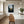Fine art photography print featuring a lone lighthouse against Iceland's rugged coastal scenery.