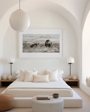 A group of lions resting together in the Ngorongoro Conservation Area, captured in a fine art wildlife photograph evoking strength and unity.