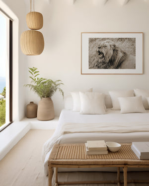 Male lion mid-yawn in Serengeti National Park, Tanzania — reclined but alert. Fine art wildlife print capturing the tension between rest and raw power.