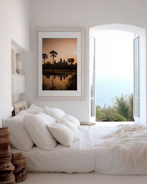 Fine art landscape photograph with warm luminous tones and soft reflection, creating a serene, atmospheric and subtly mysterious composition.
