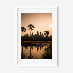 Fine art landscape photograph with warm luminous tones and soft reflection, creating a serene, atmospheric and subtly mysterious composition.