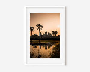 Fine art landscape photograph with warm luminous tones and soft reflection, creating a serene, atmospheric and subtly mysterious composition.