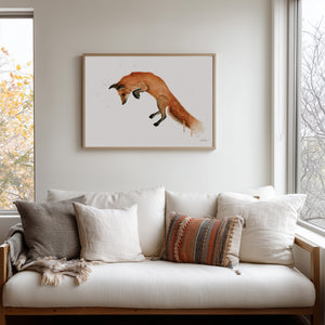 A vibrant watercolour painting of a fox mid-leap, capturing its playful energy and graceful movement. The artwork showcases delicate brushstrokes and vivid colours, highlighting the fox’s elegant form against a soft, natural background.