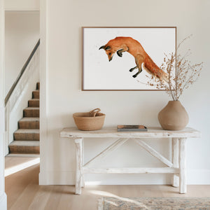 A vibrant watercolour painting of a fox mid-leap, capturing its playful energy and graceful movement. The artwork showcases delicate brushstrokes and vivid colours, highlighting the fox’s elegant form against a soft, natural background.