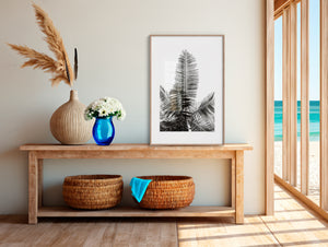 Fine art photograph of a tropical palm tree from the ground, shown in colour, black-and-white, and sepia, highlighting vertical lines, silhouette, form, and the serene beauty of nature.