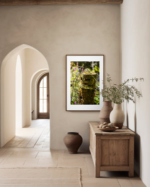 Minimal fine art photograph of a garden post, highlighting soft curves, texture, and subtle shadows in a calm, natural setting.
